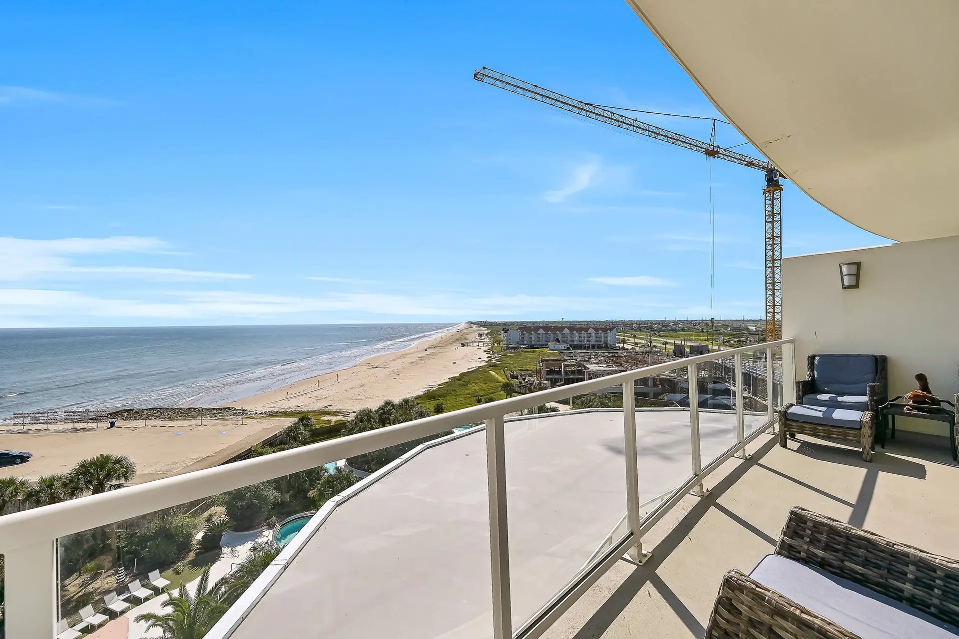 Image of a serene balcony overlooking the beach
